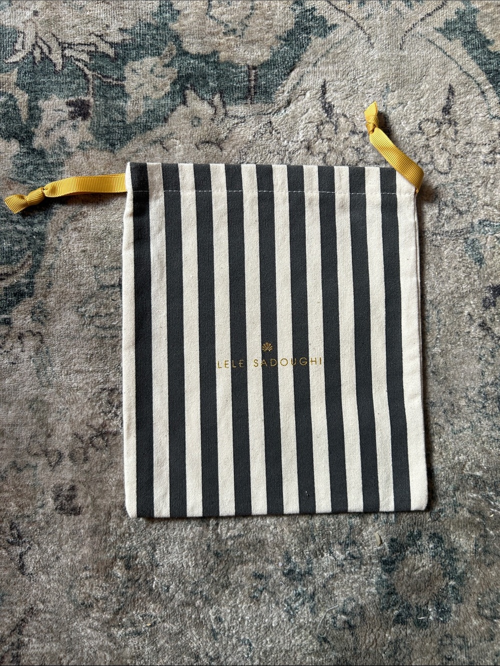 Lele Sadoughi Black & White Striped Drawstring Pouch with Yellow Ribbon Accents